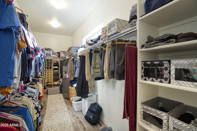 18175 W Highland Ave, Goodyear, AZ 85395 - walk in closet featuring wood finished floors