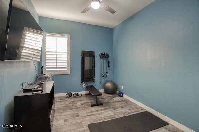 18175 W Highland Ave, Goodyear, AZ 85395 - workout room with baseboards, ceiling fan, and wood finished floors