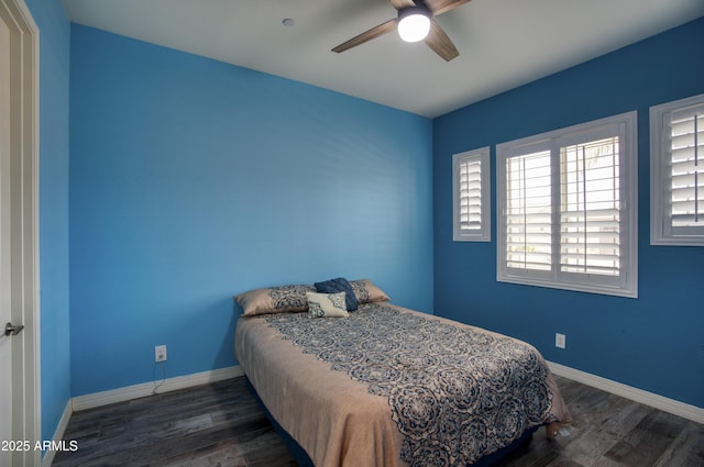 18175 W Highland Ave, Goodyear, AZ 85395 - bedroom featuring a ceiling fan, baseboards, and wood finished floors