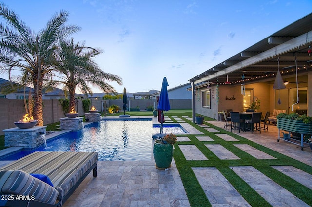 18175 W Highland Ave, Goodyear, AZ 85395 - view of pool with a patio, a fenced in pool, a fire pit, and a fenced backyard