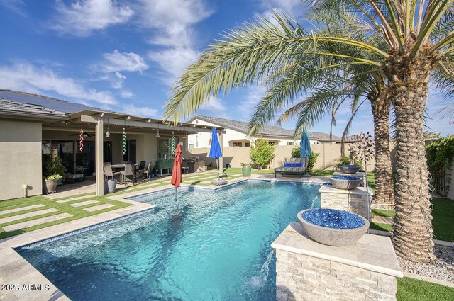 18175 W Highland Ave, Goodyear, AZ 85395 - view of swimming pool with a patio, a fenced backyard, ceiling fan, and a fenced in pool