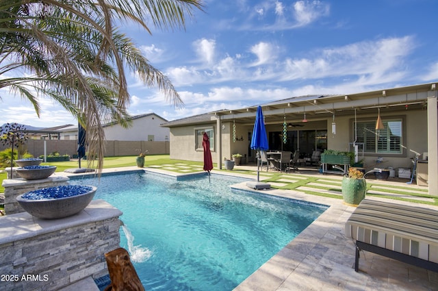 18175 W Highland Ave, Goodyear, AZ 85395 - view of swimming pool featuring fence, ceiling fan, a fenced in pool, a lawn, and a patio
