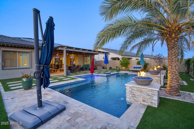 18175 W Highland Ave, Goodyear, AZ 85395 - view of pool with a patio, a fenced in pool, a fire pit, and a fenced backyard