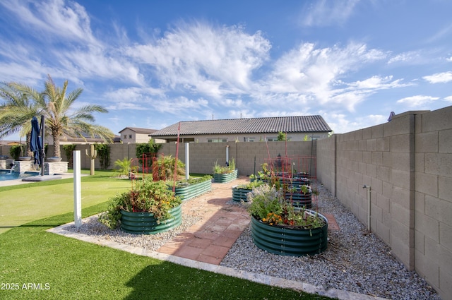 18175 W Highland Ave, Goodyear, AZ 85395 - view of yard with a fenced backyard and a garden