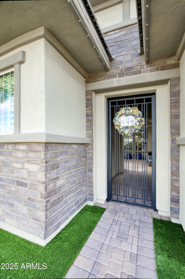 18175 W Highland Ave, Goodyear, AZ 85395 - property entrance with brick siding