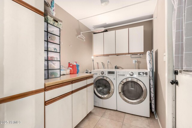 19258 N 20th Dr, Phoenix, AZ 85027 - washroom with independent washer and dryer, cabinet space, and light tile patterned floors