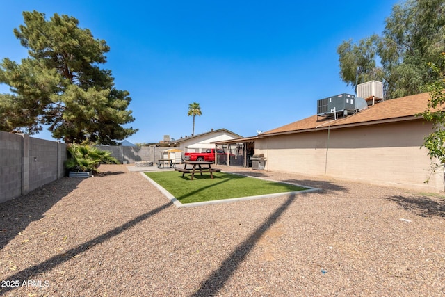 19258 N 20th Dr, Phoenix, AZ 85027 - view of yard featuring central AC unit and a fenced backyard