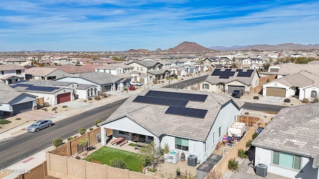 drone / aerial view with a residential view and a mountain view