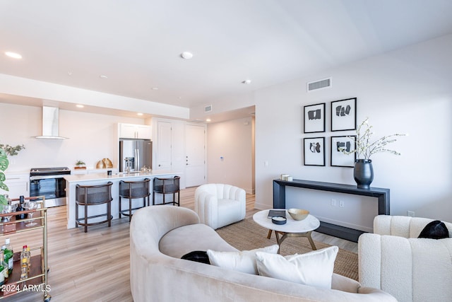 living room featuring light wood-type flooring