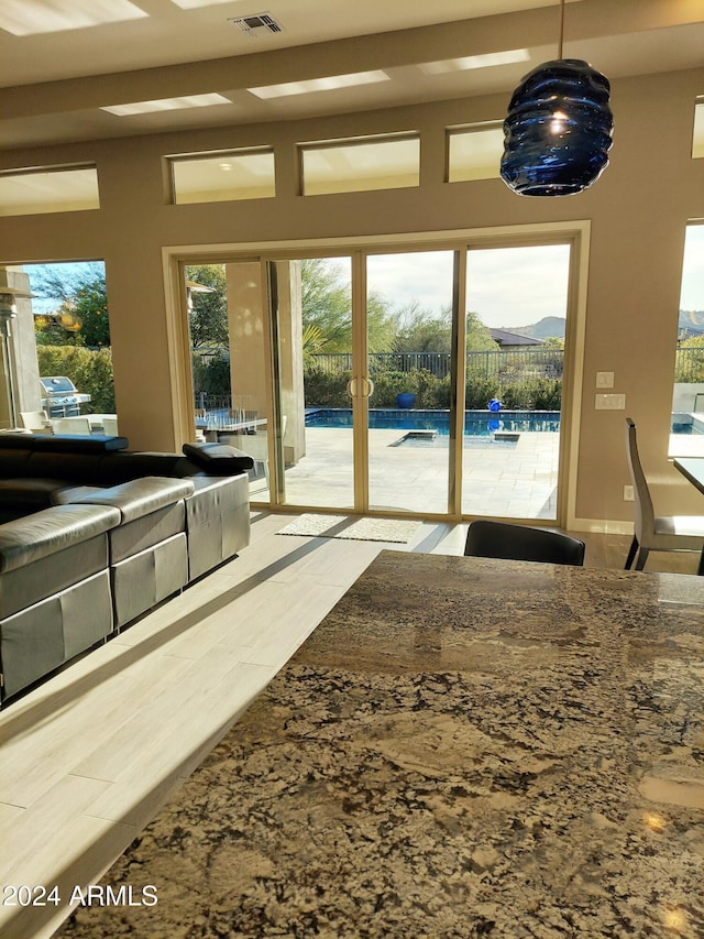 doorway to outside with a mountain view