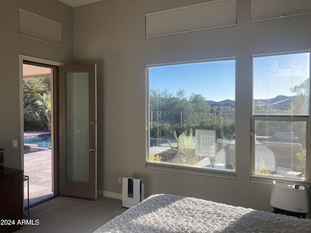 bedroom featuring a mountain view