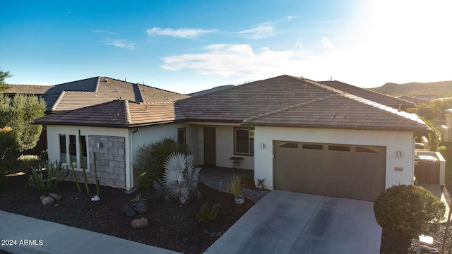 single story home with a garage