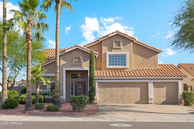 4563 E Libby St, Phoenix, AZ 85032 - mediterranean / spanish-style home with concrete driveway, stucco siding, and a tiled roof