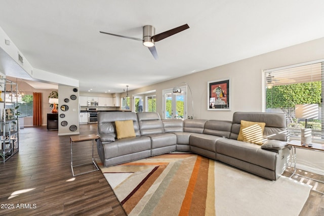 4563 E Libby St, Phoenix, AZ 85032 - living area with dark wood-style floors and ceiling fan
