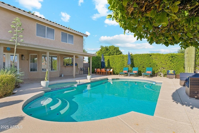 4563 E Libby St, Phoenix, AZ 85032 - view of swimming pool with a patio area and a pool with connected hot tub