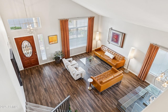 4563 E Libby St, Phoenix, AZ 85032 - living area featuring a chandelier, wood finished floors, and high vaulted ceiling