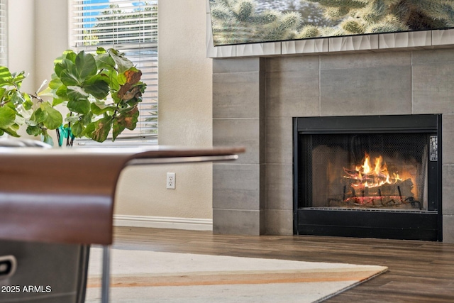 4563 E Libby St, Phoenix, AZ 85032 - detailed view of a tile fireplace and wood finished floors