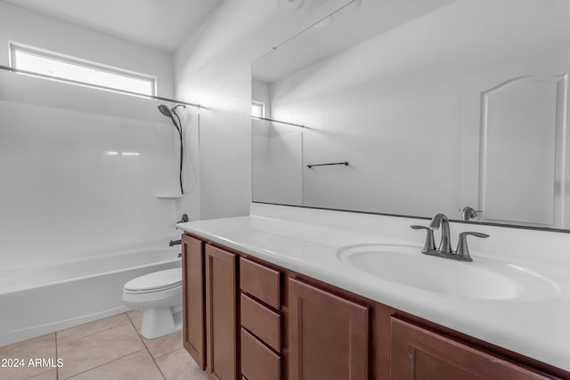 full bathroom featuring tile patterned flooring, vanity, toilet, and shower / bathtub combination