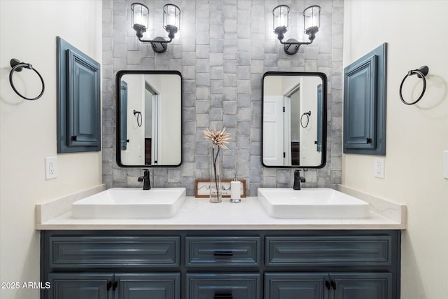 bathroom featuring a sink, tasteful backsplash, and double vanity