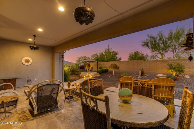 view of patio / terrace featuring outdoor dining area and a fenced backyard