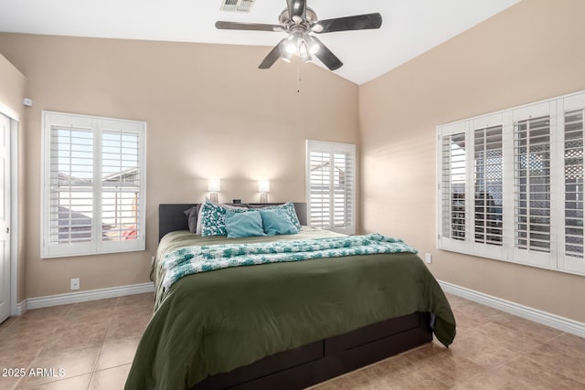 bedroom featuring light tile patterned floors, vaulted ceiling, and ceiling fan