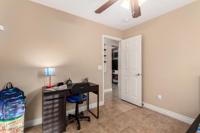 office area with ceiling fan and light tile patterned floors