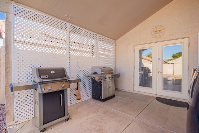 view of patio with french doors and area for grilling