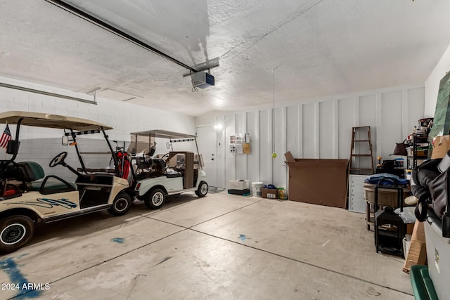 garage featuring a garage door opener