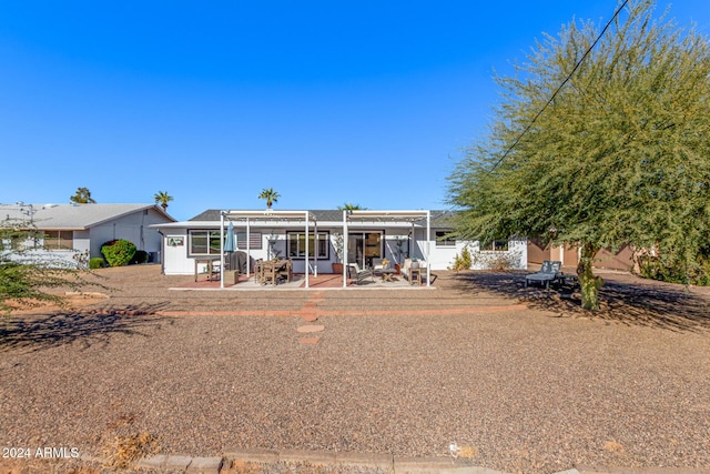 view of front of house with a patio