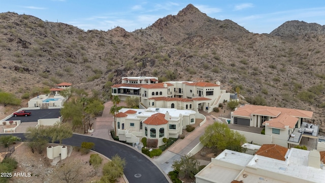 bird's eye view with a mountain view and view of desert