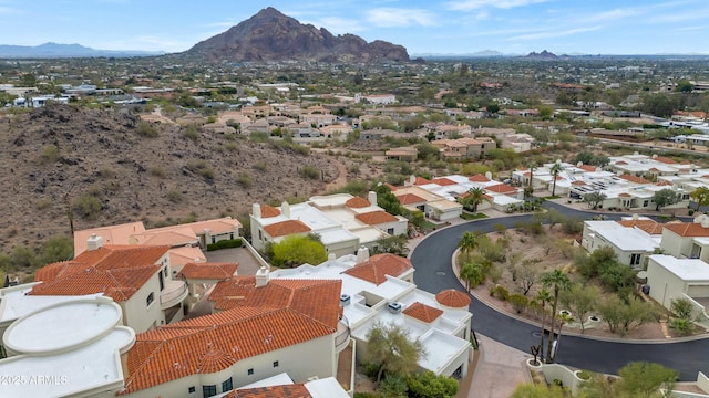 drone / aerial view featuring a residential view and a mountain view