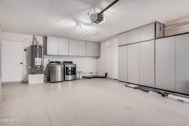 garage with washer and clothes dryer, water heater, and a garage door opener