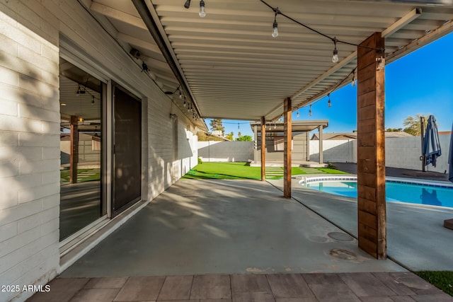 view of patio / terrace with a fenced in pool and a fenced backyard