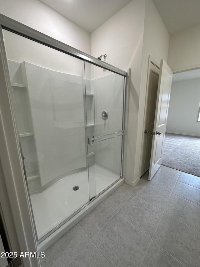 6064 E Artemis Dr, Florence, AZ 85132 - full bathroom with a shower stall, tile patterned flooring, and baseboards