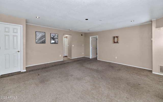 carpeted spare room with crown molding, recessed lighting, and baseboards