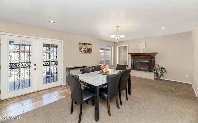 dining area featuring an inviting chandelier, light carpet, baseboards, recessed lighting, and french doors