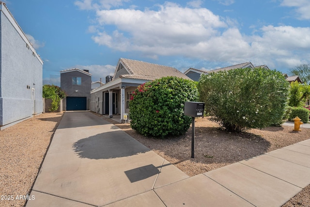2731 E Windsor Ave, Phoenix, AZ 85008 - view of front of home featuring concrete driveway, an attached garage, and stucco siding