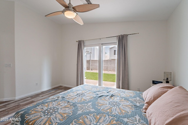 2731 E Windsor Ave, Phoenix, AZ 85008 - bedroom with access to exterior, wood finished floors, baseboards, and a ceiling fan