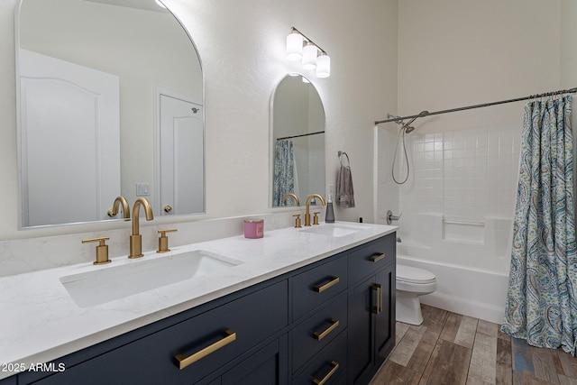 2731 E Windsor Ave, Phoenix, AZ 85008 - full bath featuring wood finished floors, double vanity, toilet, and shower / bathtub combination with curtain