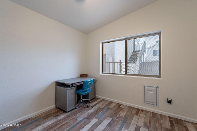 2731 E Windsor Ave, Phoenix, AZ 85008 - office with vaulted ceiling, wood finished floors, and baseboards