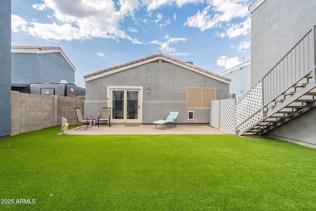 2731 E Windsor Ave, Phoenix, AZ 85008 - back of property with a tiled roof, a patio area, and stairway