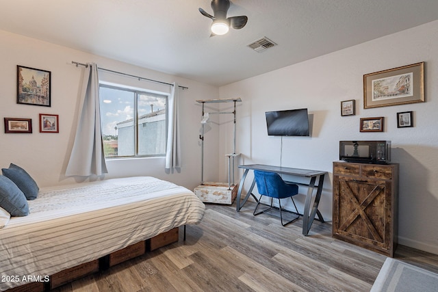 2731 E Windsor Ave, Phoenix, AZ 85008 - bedroom featuring wood finished floors and baseboards