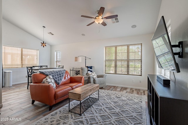 2731 E Windsor Ave, Phoenix, AZ 85008 - living room featuring lofted ceiling, light wood-style floors, healthy amount of natural light, and a ceiling fan