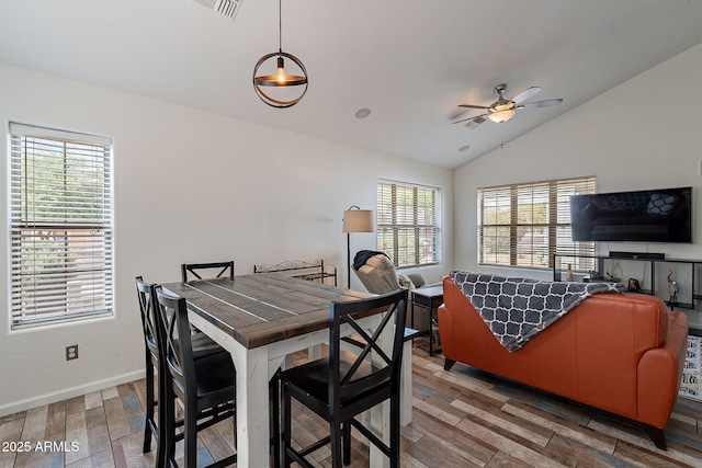 2731 E Windsor Ave, Phoenix, AZ 85008 - dining room with light wood-style floors, lofted ceiling, a ceiling fan, and baseboards