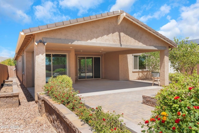 4853 N 183rd Ln, Goodyear, AZ 85395 - back of house with stucco siding and a patio