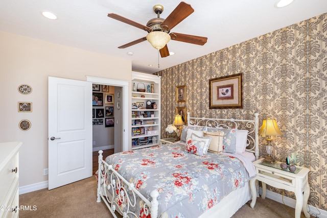 carpeted bedroom with recessed lighting, baseboards, ceiling fan, and wallpapered walls
