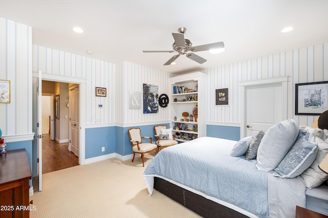carpeted bedroom featuring recessed lighting, wallpapered walls, baseboards, and a ceiling fan