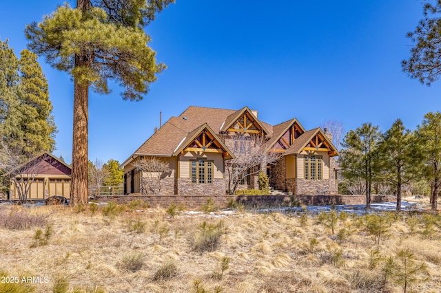 view of front of property with stone siding