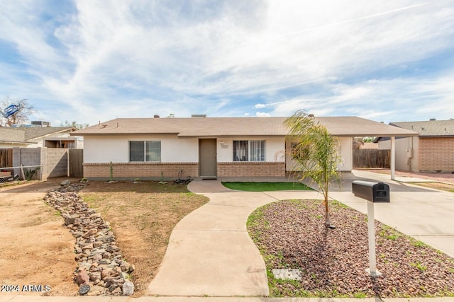 ranch-style home with a carport