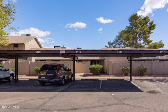 view of car parking featuring a carport